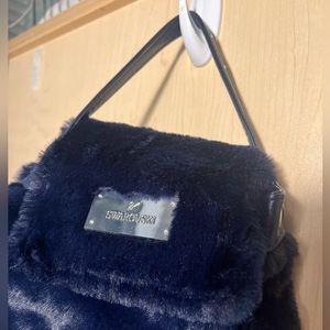Swarovski mini fur backpack with adjustable opening and straps. Brand new.